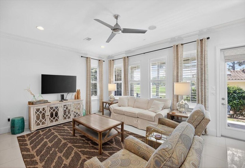 Step into coastal elegance in the popular Villa Lago community - photo 2