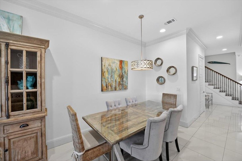 Step into coastal elegance in the popular Villa Lago community - photo 7