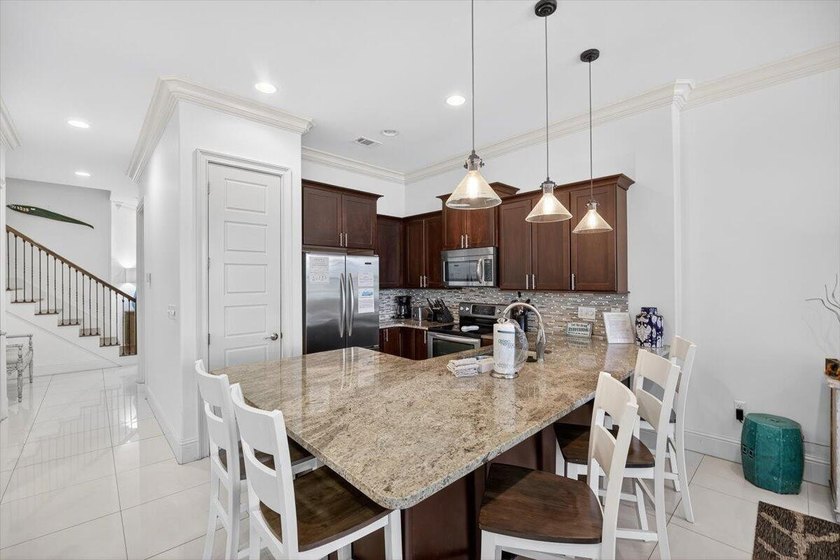 Step into coastal elegance in the popular Villa Lago community - photo 8