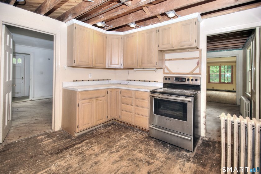 Nestled on approximately 1.1 acres in Southport, this classic - photo 11