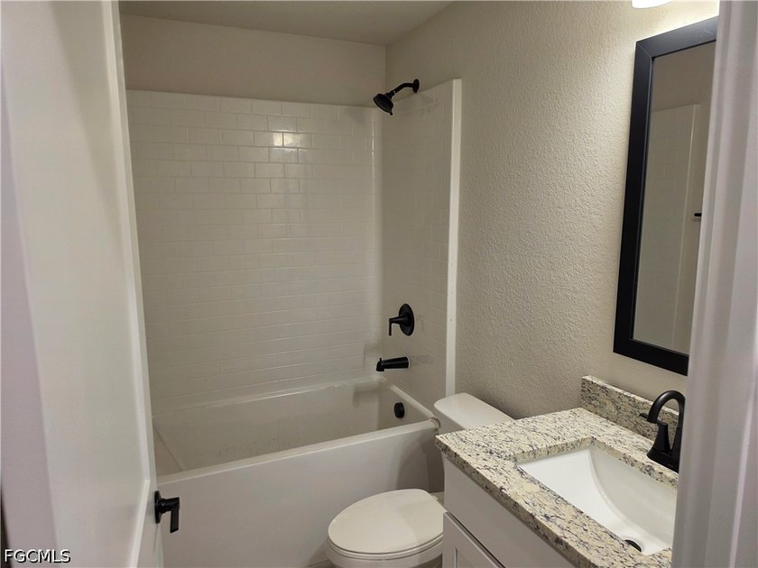 New Construction - Experience the pinnacle of Florida living in - photo 11