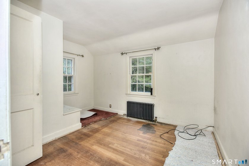 Nestled on approximately 1.1 acres in Southport, this classic - photo 12