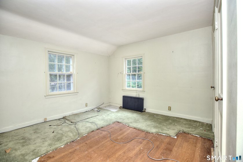 Nestled on approximately 1.1 acres in Southport, this classic - photo 14