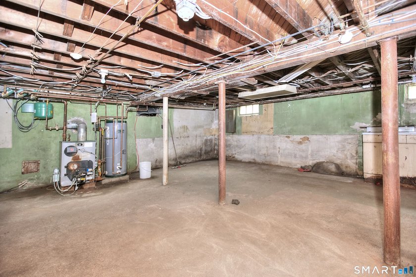 Nestled on approximately 1.1 acres in Southport, this classic - photo 21