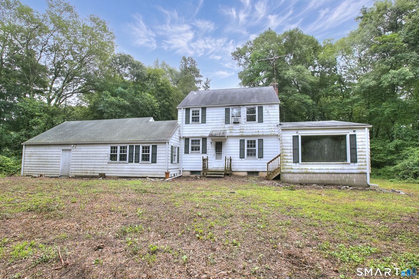 Nestled on approximately 1.1 acres in Southport, this classic - photo 28