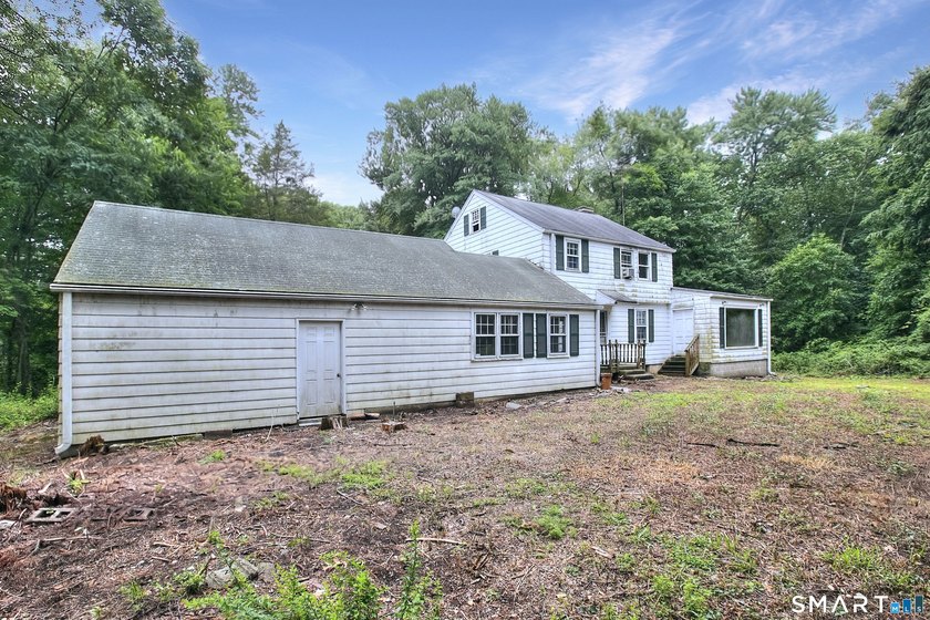 Nestled on approximately 1.1 acres in Southport, this classic - photo 29