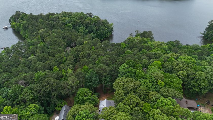 Welcome to a truly one-of-a-kind waterfront retreat where rustic - photo 3