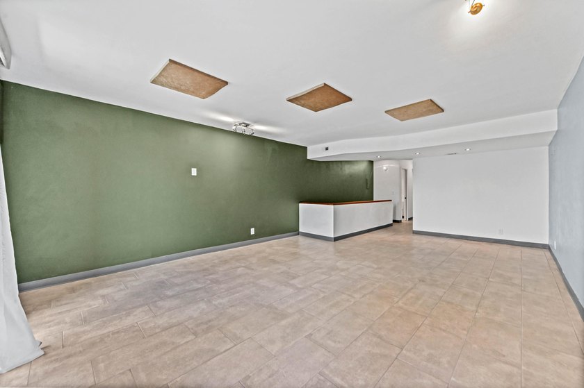 Stylishly updated 2-bedroom, 1.5-bathroom corner unit in the - photo 11