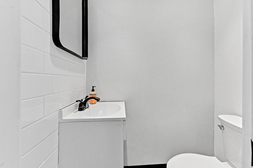 Stylishly updated 2-bedroom, 1.5-bathroom corner unit in the - photo 12