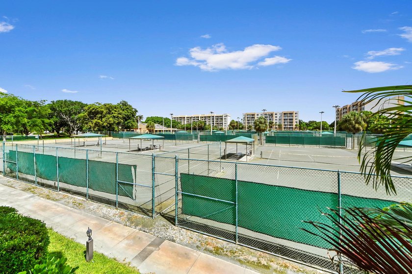 Stylishly updated 2-bedroom, 1.5-bathroom corner unit in the - photo 16