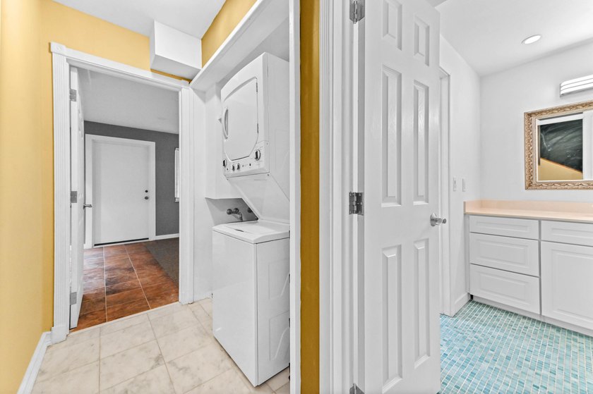 Stylishly updated 2-bedroom, 1.5-bathroom corner unit in the - photo 18