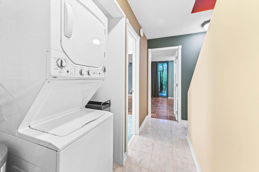 Stylishly updated 2-bedroom, 1.5-bathroom corner unit in the - photo 19