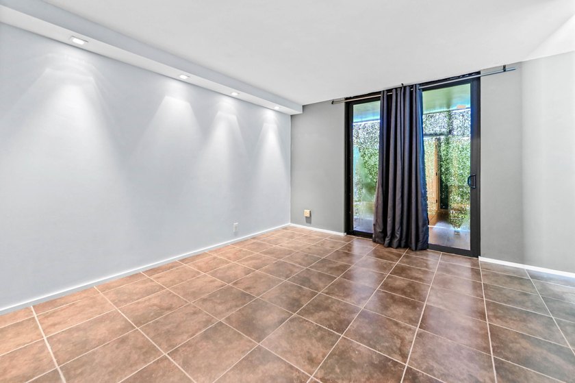 Stylishly updated 2-bedroom, 1.5-bathroom corner unit in the - photo 21
