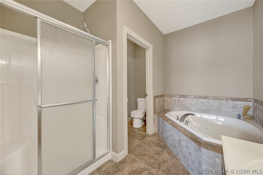 Lake front life never looked so good! Check out this 3 bedroom 2 - photo 22