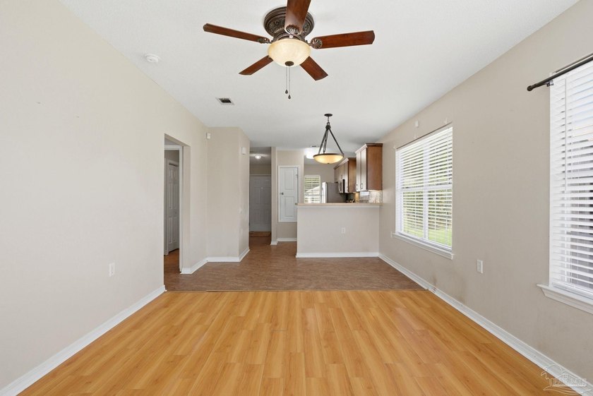 Charming end-unit cottage with an open floor plan that is - photo 2