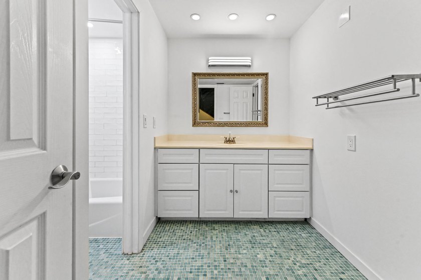Stylishly updated 2-bedroom, 1.5-bathroom corner unit in the - photo 25