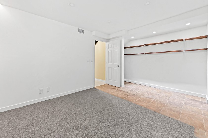 Stylishly updated 2-bedroom, 1.5-bathroom corner unit in the - photo 29