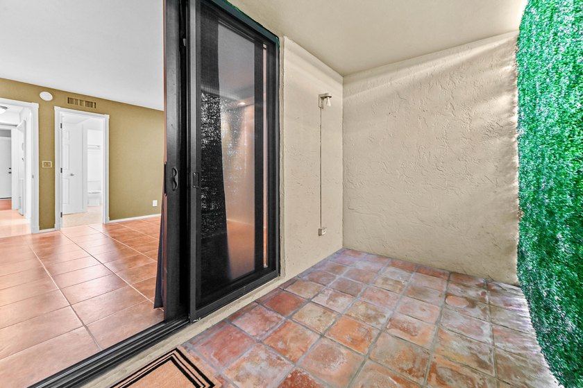 Stylishly updated 2-bedroom, 1.5-bathroom corner unit in the - photo 32