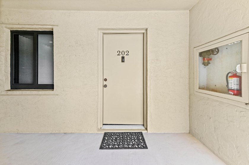 Stylishly updated 2-bedroom, 1.5-bathroom corner unit in the - photo 33