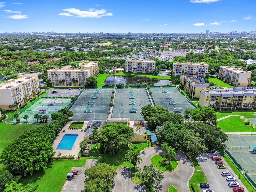 Stylishly updated 2-bedroom, 1.5-bathroom corner unit in the - photo 39