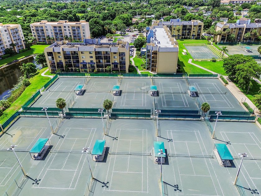 Stylishly updated 2-bedroom, 1.5-bathroom corner unit in the - photo 41