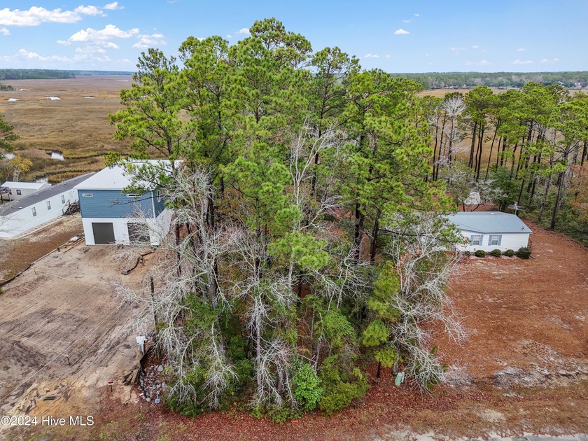Tucked away in the peaceful waterfront community of Riverside - photo 4