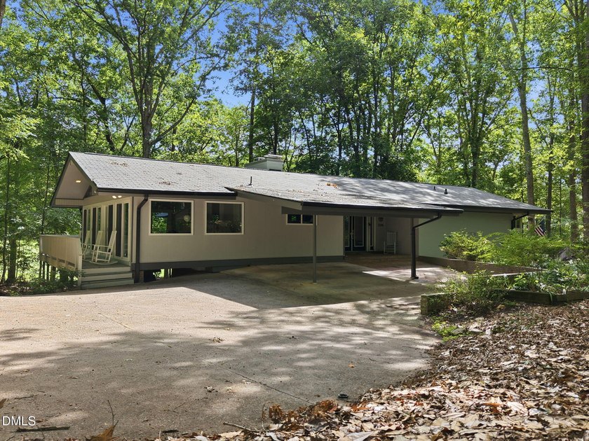 Set on two lots totaling 1.3 acres with panoramic views of the - photo 5