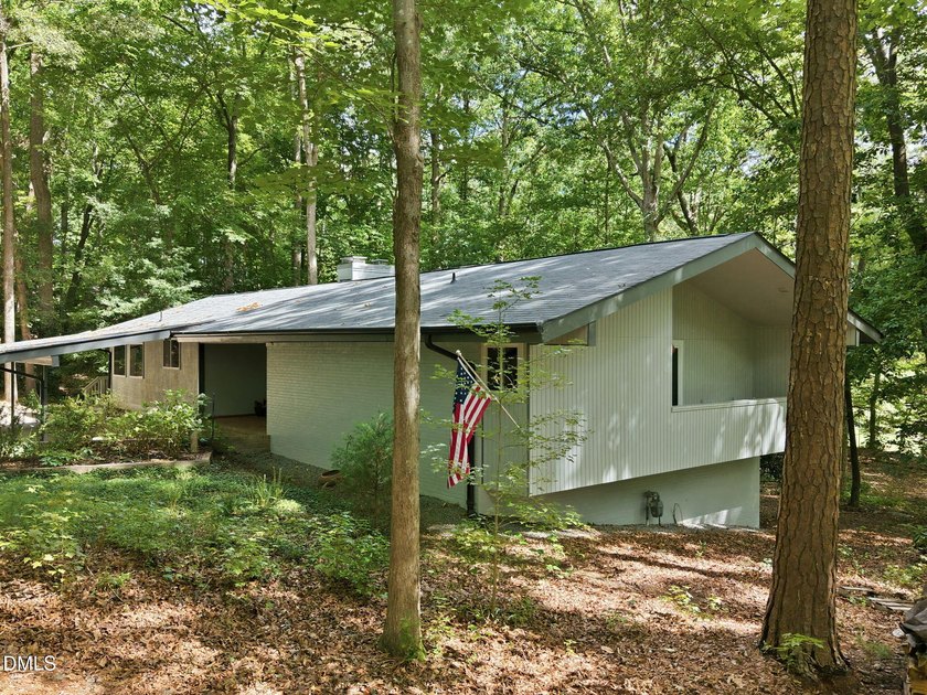 Set on two lots totaling 1.3 acres with panoramic views of the - photo 6