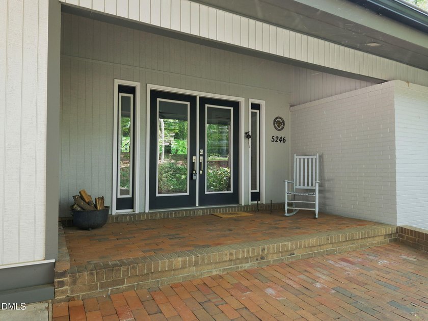 Set on two lots totaling 1.3 acres with panoramic views of the - photo 7