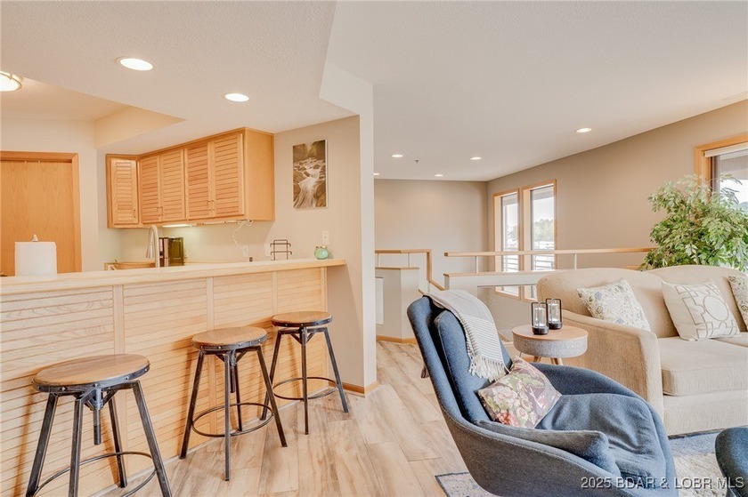 Beautiful, light and bright 2 level condo that feels more like a - photo 5