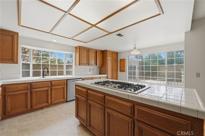 Welcome to this beautiful four-bedroom, three-bathroom home with - photo 16