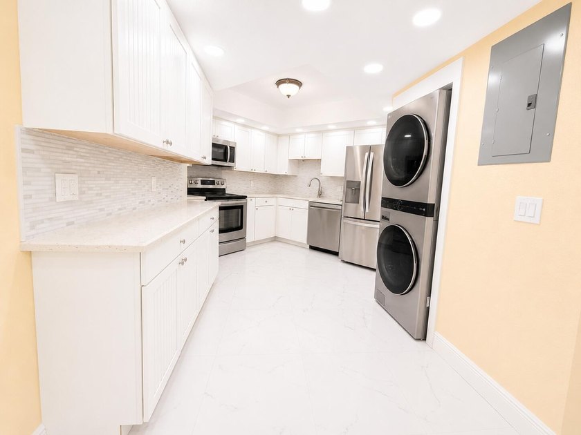 Welcome to the newly transformed Dune Deck Condominium, where - photo 24