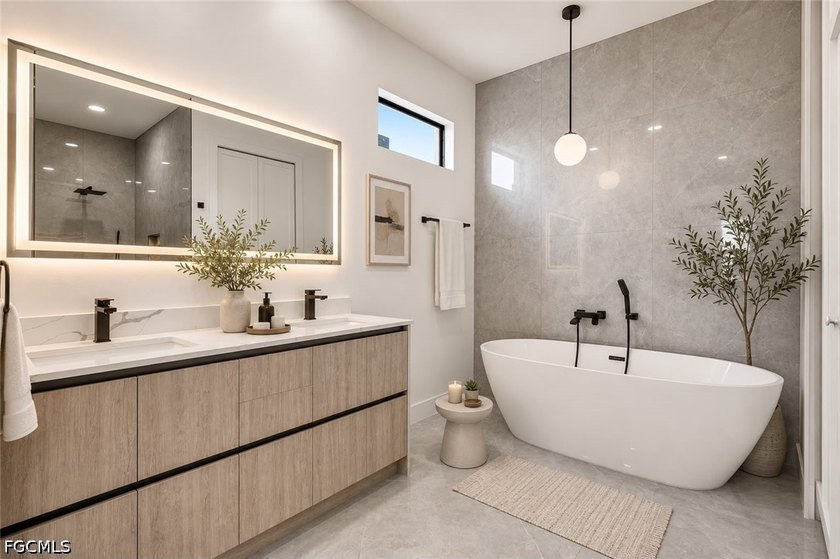 Welcome to clean, modern living without breaking the bank. This - photo 22