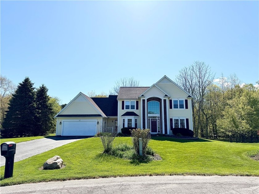 Spacious 4-bedroom, 2.5-bath home featuring a dramatic 2-story - photo 2