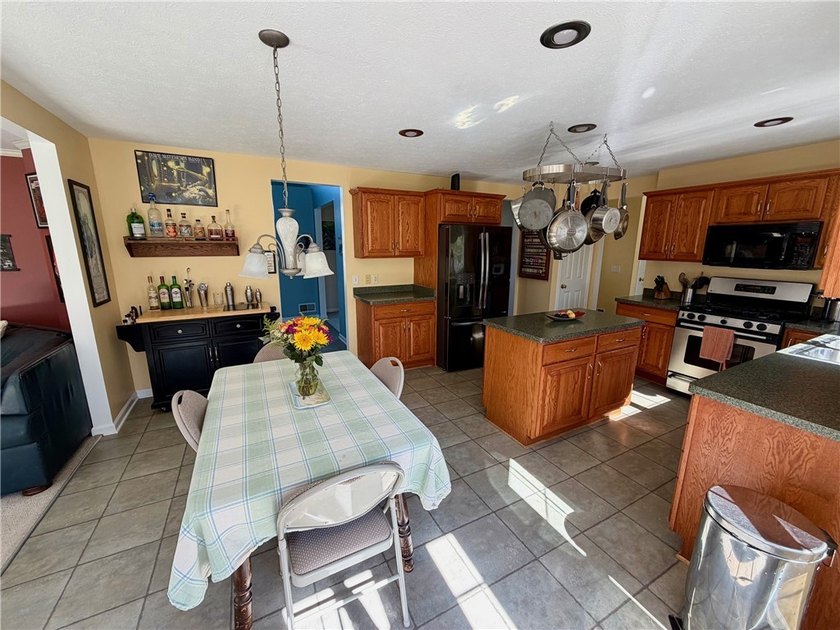 Spacious 4-bedroom, 2.5-bath home featuring a dramatic 2-story - photo 8