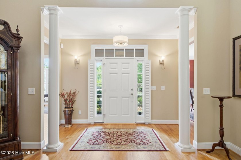 Welcome to 2118 Bay Colony Lane, an elegant 1.5-story brick - photo 2
