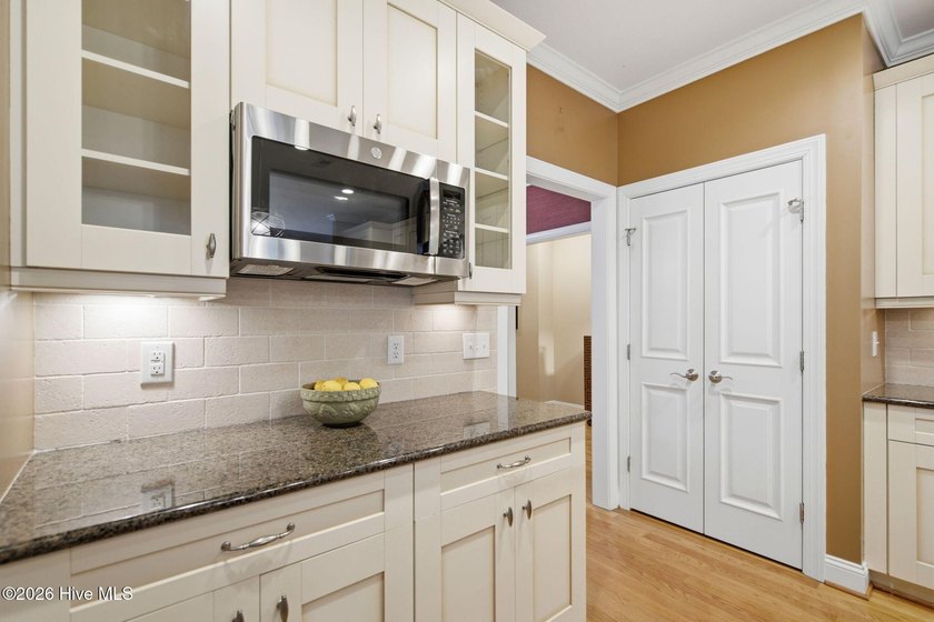 Welcome to 2118 Bay Colony Lane, an elegant 1.5-story brick - photo 10