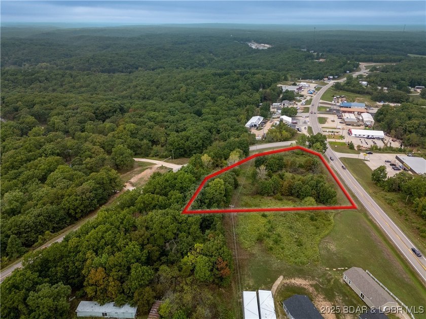 Nearly 2 acres of undeveloped land perfectly positioned on the - photo 6