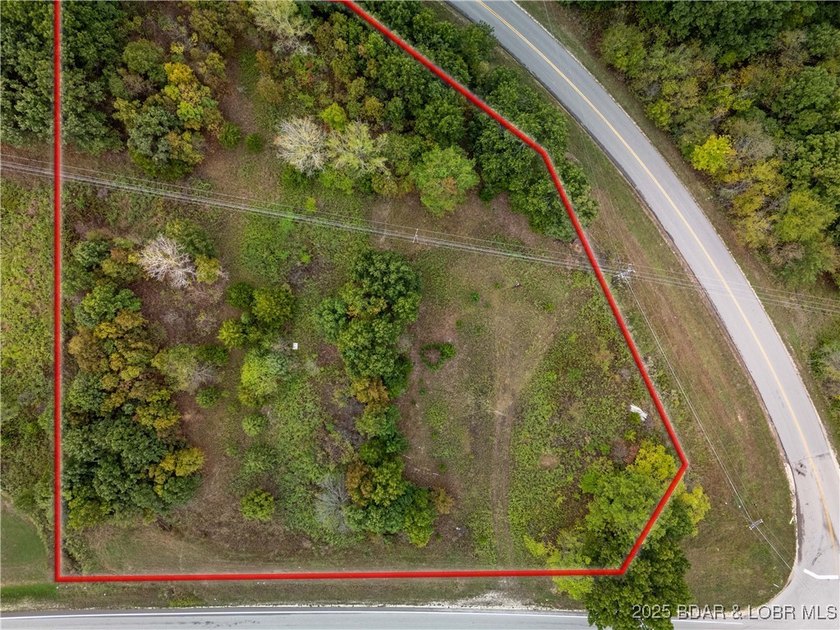 Nearly 2 acres of undeveloped land perfectly positioned on the - photo 8