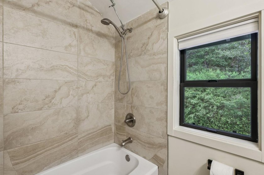 This inviting 4 bedroom, 2 and a half bathroom home, fully - photo 21