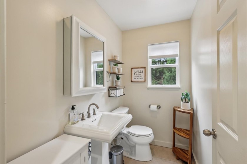 This inviting 4 bedroom, 2 and a half bathroom home, fully - photo 23