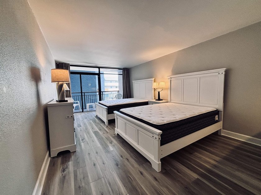 Like-new and fully remodeled, this beautifully updated condo is - photo 11