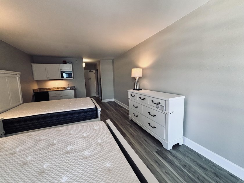 Like-new and fully remodeled, this beautifully updated condo is - photo 12