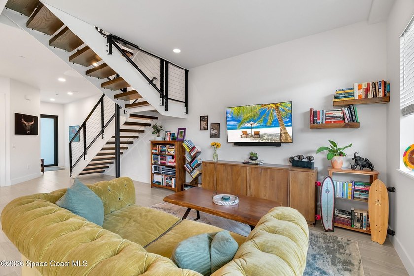 Built in 2024, this stunning end-unit townhome offers the - photo 9