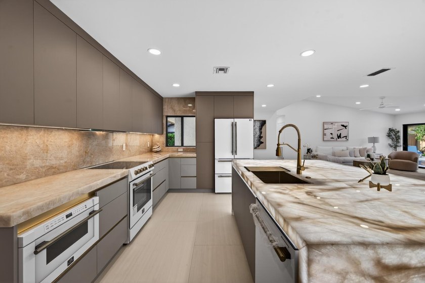 Exquisitely reimagined, this stunning 3-bedroom, 2-bath - photo 11