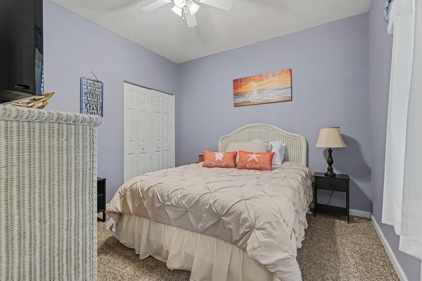 This updated second-floor, 3-bedroom, 2-bath condo overlooks the - photo 14