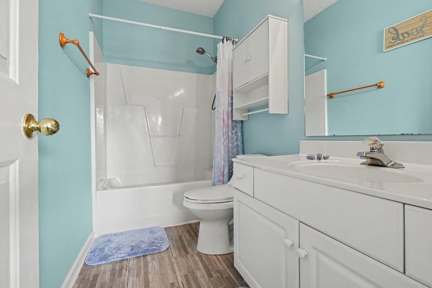 This updated second-floor, 3-bedroom, 2-bath condo overlooks the - photo 20