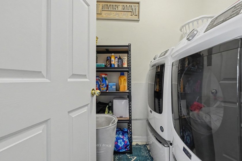 This updated second-floor, 3-bedroom, 2-bath condo overlooks the - photo 21