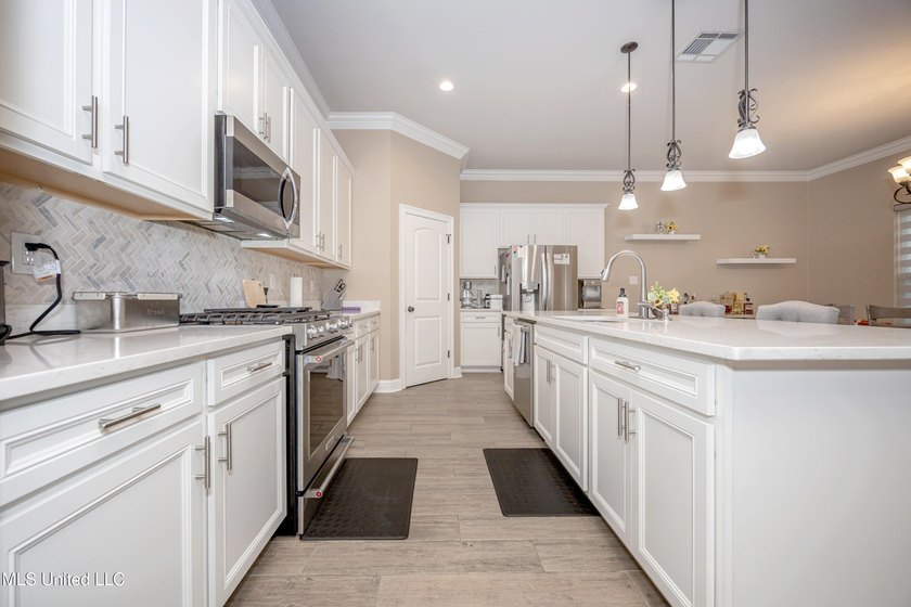 WELCOME TO YOUR DREAM HOME IN OCEAN SPRINGS, MISSISSIPPI! This - photo 21