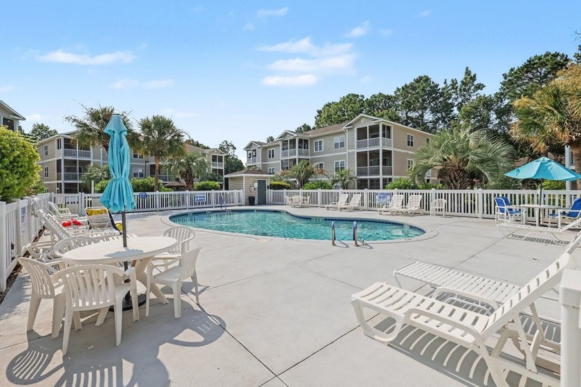 This updated second-floor, 3-bedroom, 2-bath condo overlooks the - photo 28